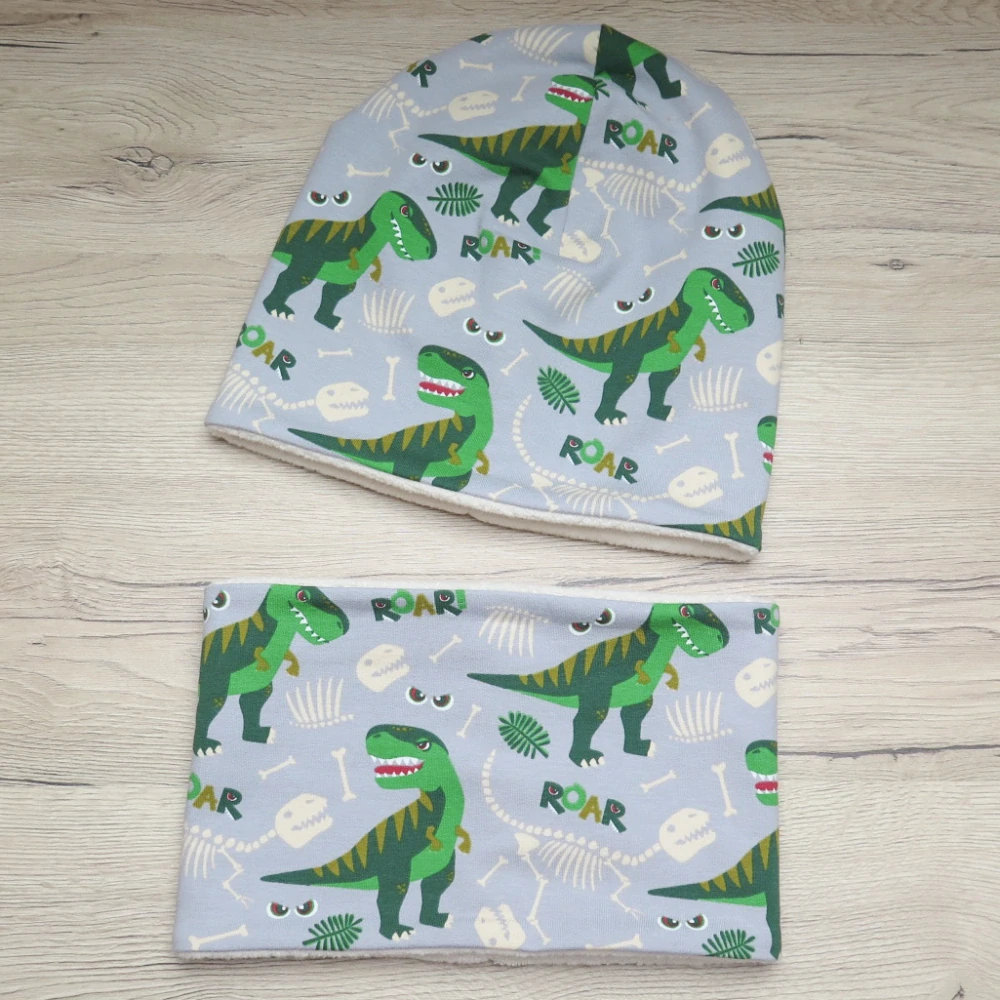 Rastúca ZATEPLENÁ zimná čiapka DINO